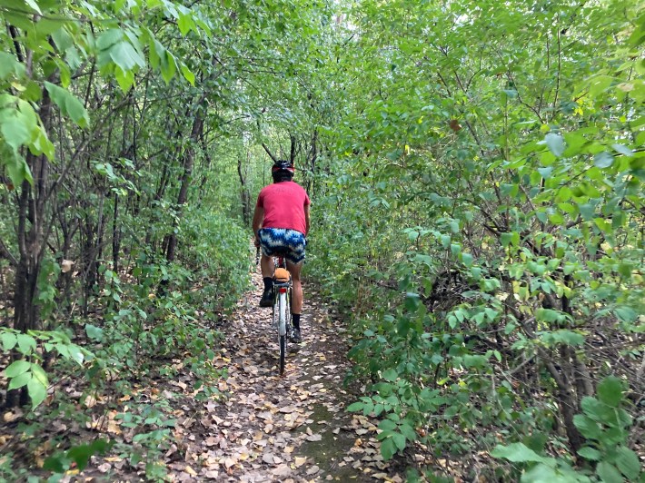 Kevin rides on one of the dirt trails on the east bank of the channel. Photo: John Greenfield