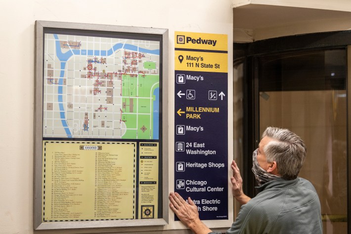 New wayfinding signs are installed in the Pedway System in Chicago's Loop; November 2021.