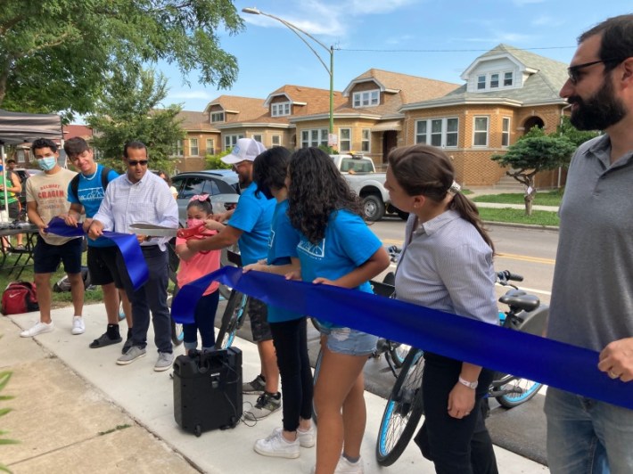Cutting the ribbon on the new Divvy station by Cragin Park last August. Photo: John Greenfield