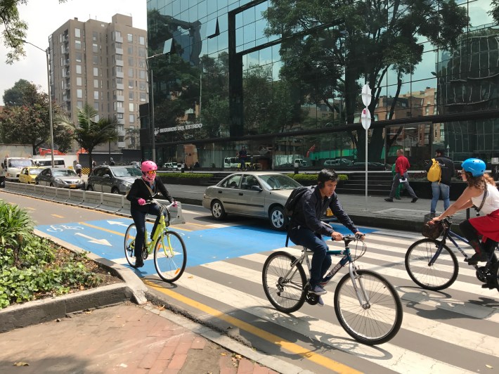 A two-way protected bike lane in Bogotá, Colombia, created by converting a mixed-traffic lane. Photo: John Greenfield