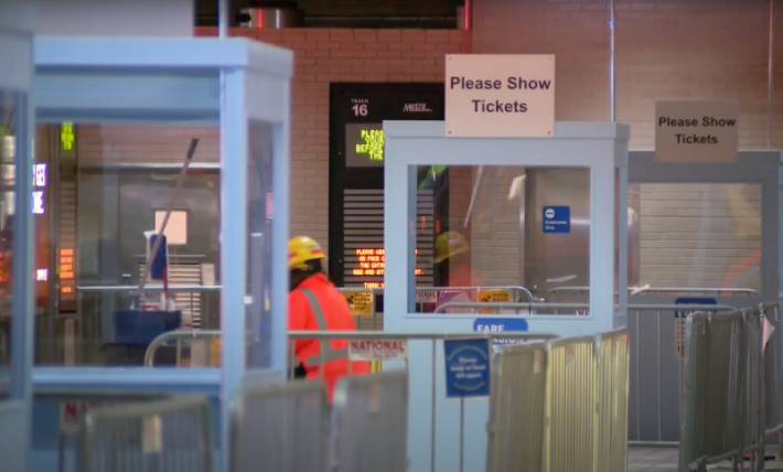 Ticket verification booths at the Ogilvie Center in October 2020, when Union Pacific was refusing to have its conductors check tickets onboard Metra trains. Image: WGN News