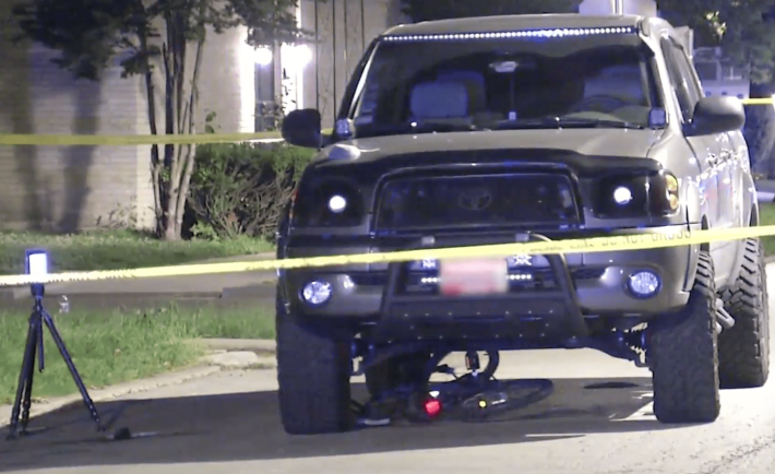 The officer’s truck with Hershel Weinberger's bike under it. Image: WGN News