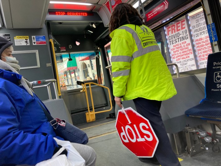 A crossing guard on a CTA bus. Photo: John Greenfield