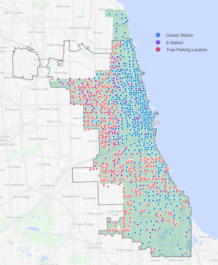 Map of the current Divvy service area (green), showing traditional docking stations (blue dots), e-stations (purple dots), and planned bike corral locations (red dots.) Image: Lyft