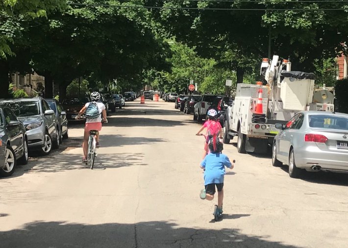 A family using the Leland Avenue Slow Street in Lincoln Square. Photo: John Greenfield