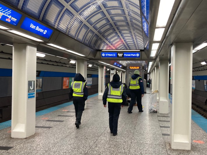 Security guards at the Jackson Blue Line station. Photo: John Greenfield