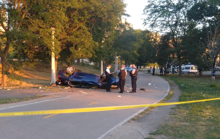 In September 2020, a driver flipped their car onto the Lakefront Trail near Belmont Avenue, seriously injuring two of the occupants. Photo provided by a reader.