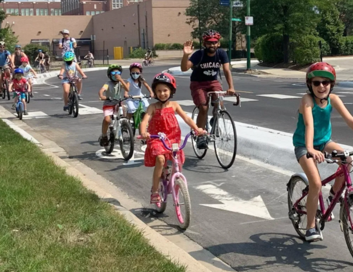 The concrete curb-protected bike lanes on Campbell Avenue between Roscoe and Belmont avenues in North Center are a relatively rare example of a Chicago bike route with sturdy protection from drivers. Photo: Rebecca Resman, Chicago Family Biking