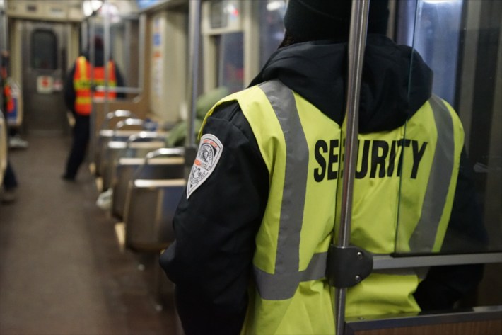 Security guards on an 'L' car. Photo: CTA