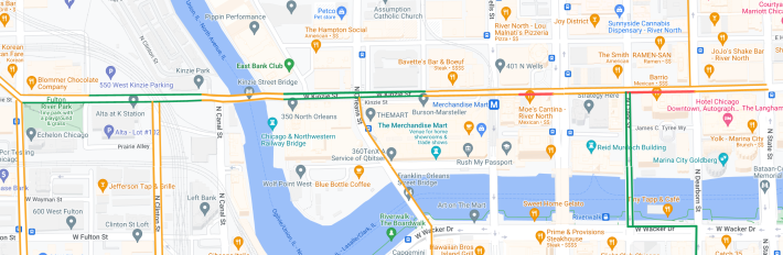 The Kinzie corridor. New curb protection is shown in green, non-protected bike lanes are colored orange, and problem areas where people on bikes are forced to share the travel lane with drivers are shown in red. Image: John Greenfield via Google Maps