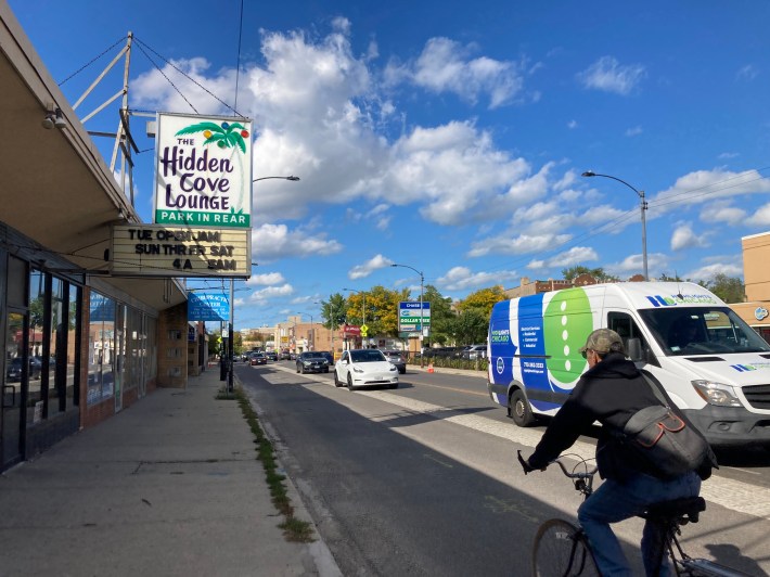 A Person bikes on Lincoln Avenue near Summerdale Avenue. (Yes, biking against traffic is illegal in Chicago and unsafe, but well-designed protected bike lanes encourage bike riders to follow traffic rules.) Photo: John Greenfield