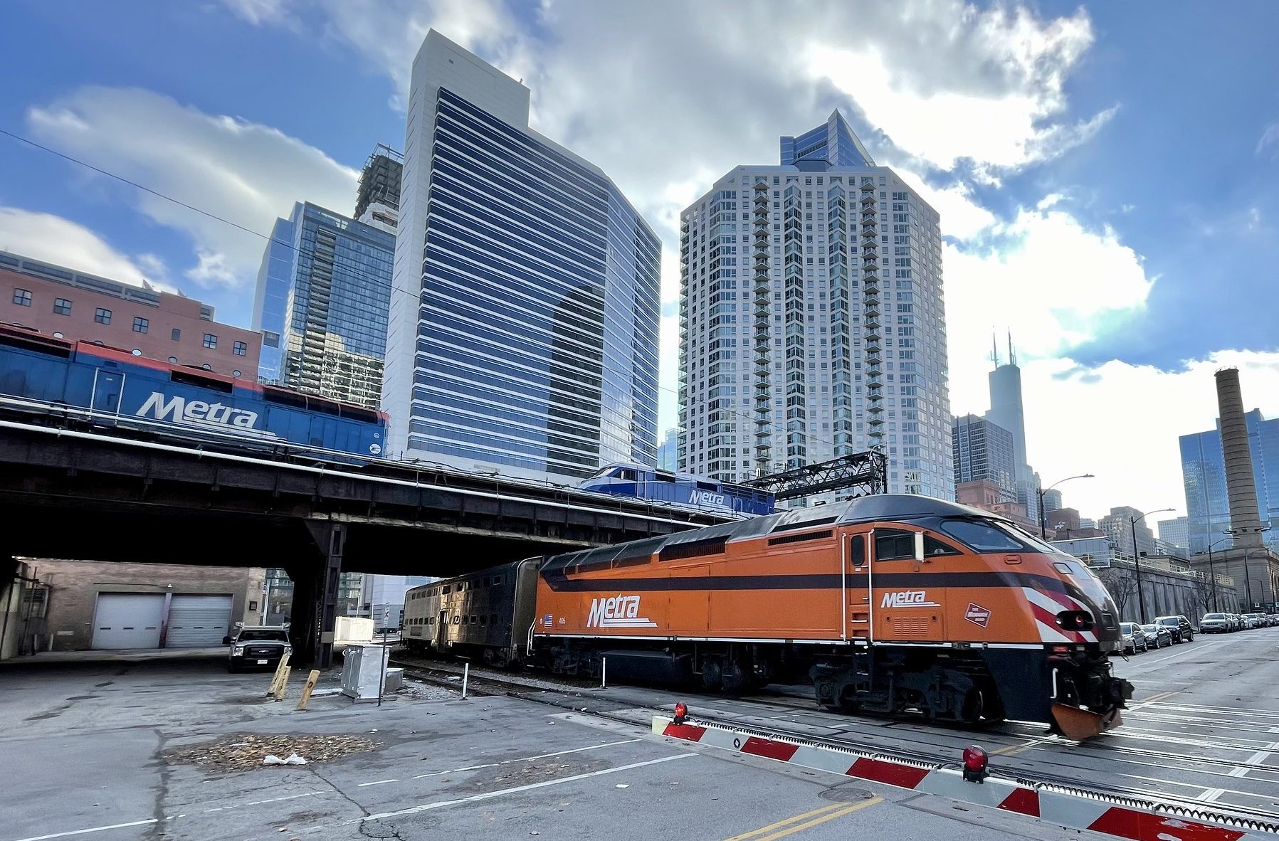 A Metra train crosses Clinton Street
