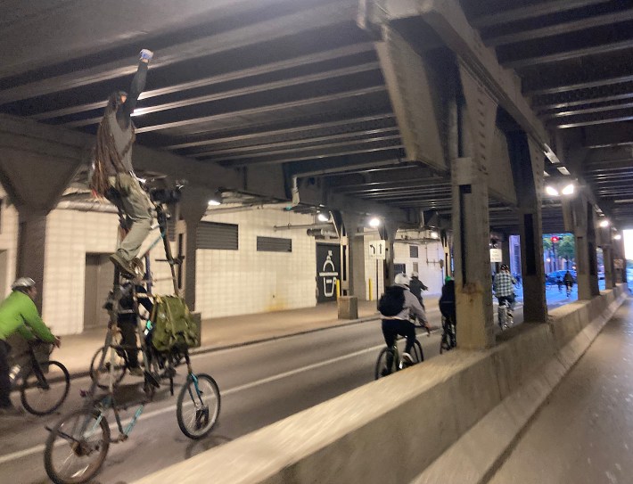 Rat Patrol chopper bike gang member Y Ly Coyote rides through the Metra commuter rail viaduct on Randolph Street. Photo: John Greenfield