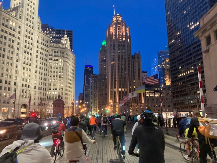 Riders cross the DuSable Bridge on Michigan Avenue into the Magnificent Mile, where bystanders cheered them on. Photo: John Greenfield