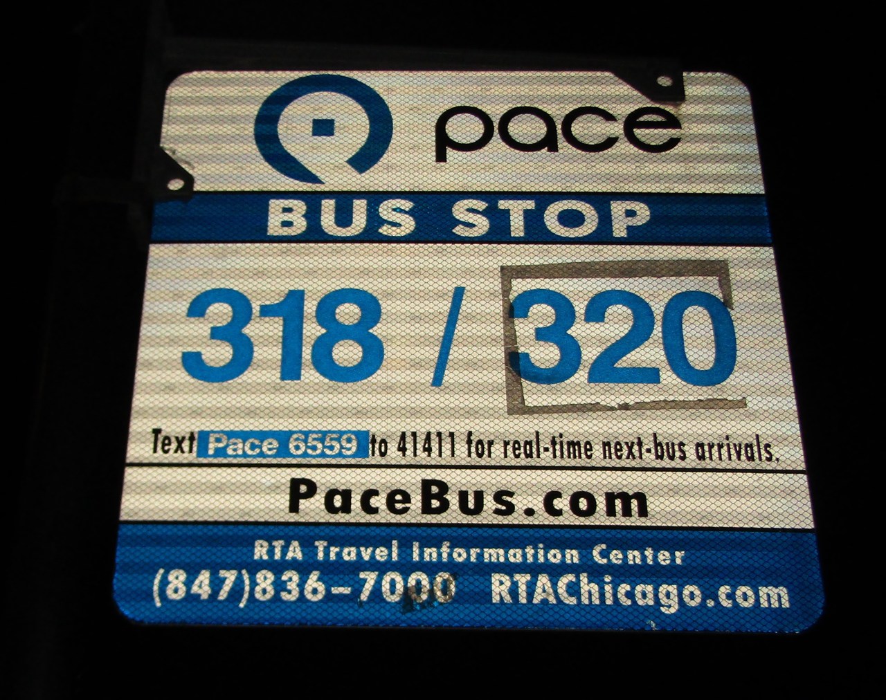 bus stop sign with the suspended Route 320 that I took last night (the signs had “320” part taped over, but, as you can see, it didn’t stick