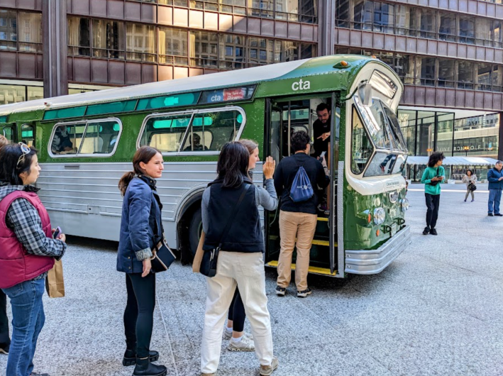 A "green limousine" bus parked in the plaza. Photo: Eric Allix Rogers