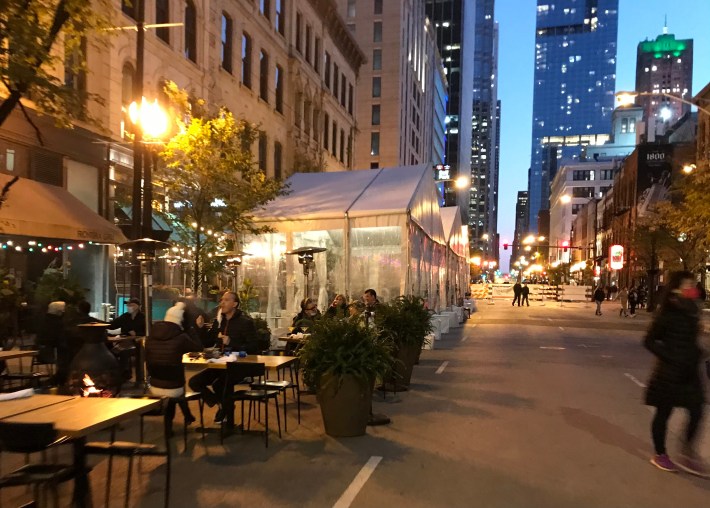 Heat lamps and tents help extend the outdoor dining season on Clark. Photo: John Greenfield