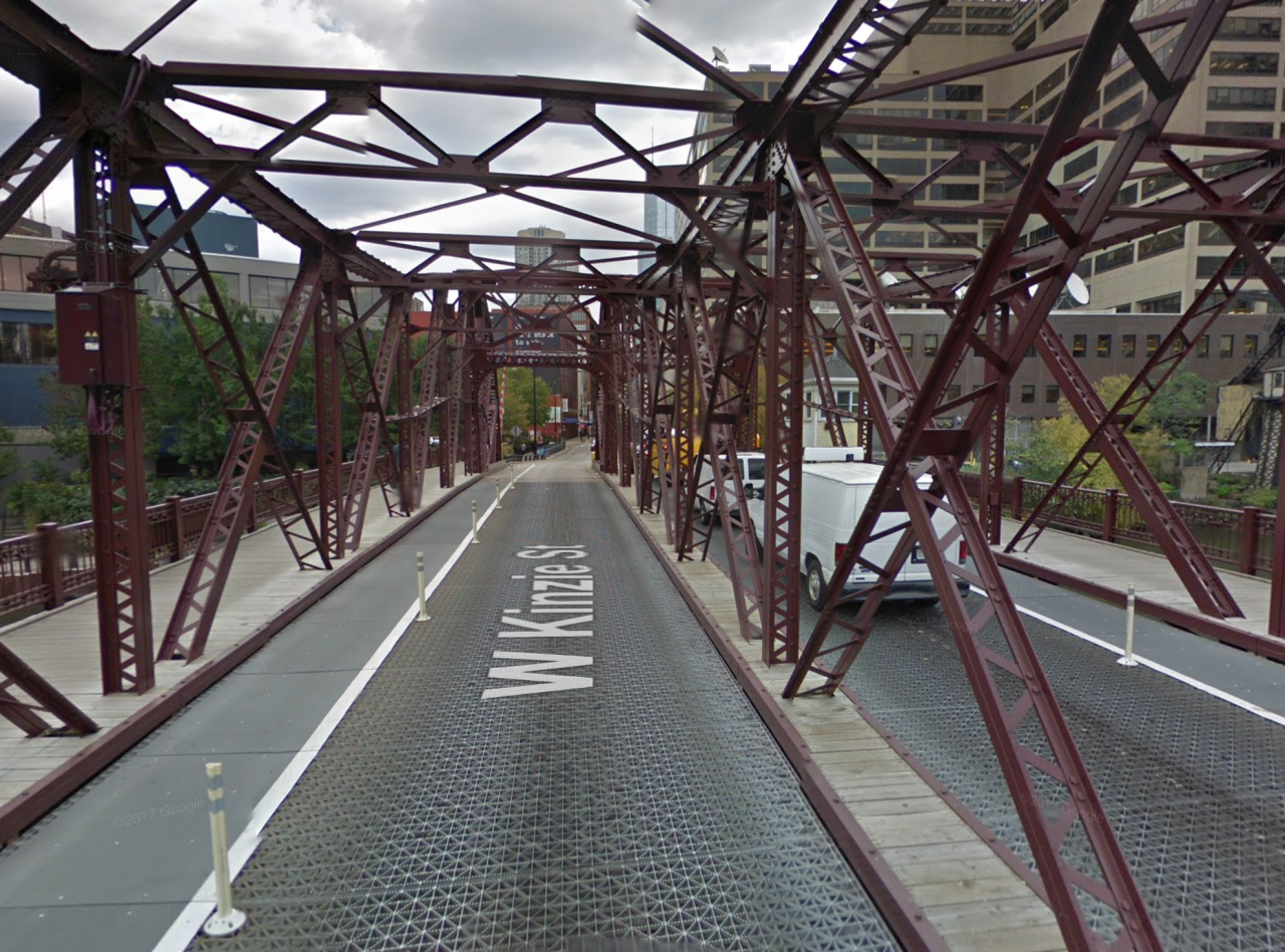 Flexible posts along the bike lanes on the Kinzie Street bridge in River North. These posts are regularly destroyed by drivers. Image: Google Maps