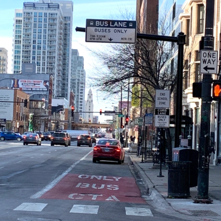 A driver blocks the Chicago Avenue bus lane near Clark Street. Photo: CDOT