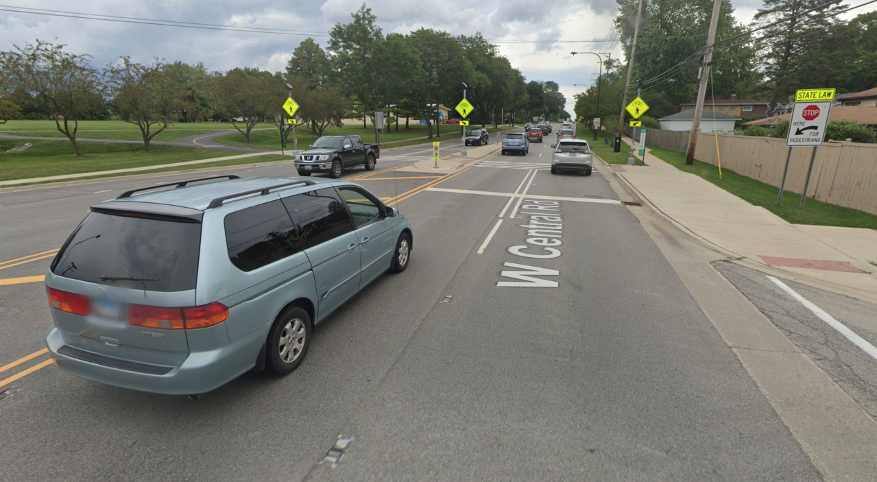 The RRFB intersection in Mount Prospect where a negligent driver disobeyed the signal and crosswalk law and killed Joni Beaudry in 2016, looking east. Image: Google Maps