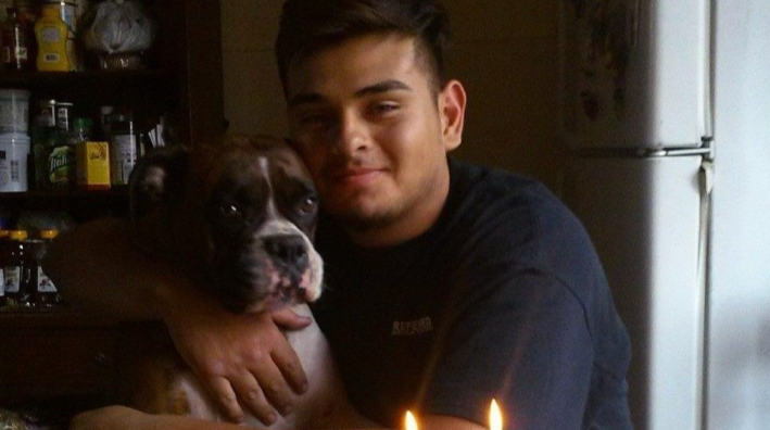 Kevin Herrera with his dog Layla.