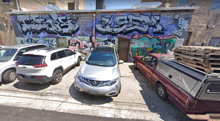 Parking spaces behind Gillman's Hardware. Image: Google Maps