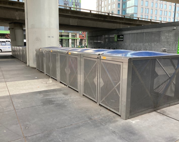 Bike lockers at Oakland's Macarthur BART station.