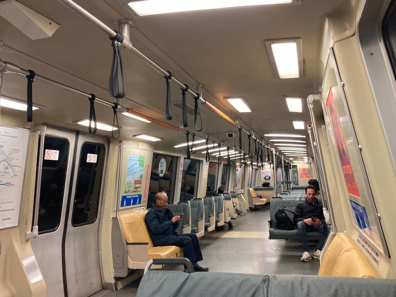 The interior of a BART railcar. Note the soft vinyl seats. Photo: John Greenfield