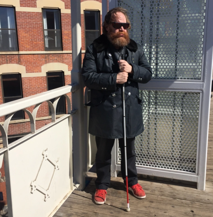 Andy Slater at the Damen Blue Line station in Wicker Park. Photo: Baron Von Slater