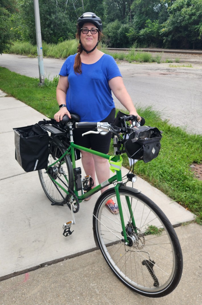Jane Healey poses with her bike outside Calumet Park at the Lake Calumet Bike Network Study Tour, August 19