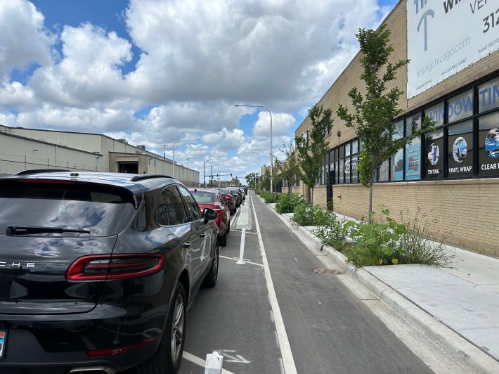 The project also converted a slip lane into a new plaza, and includes a host of other good walk/bike/transit features.